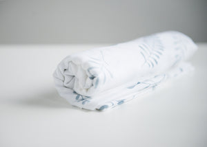 blue and white muslin wrap 